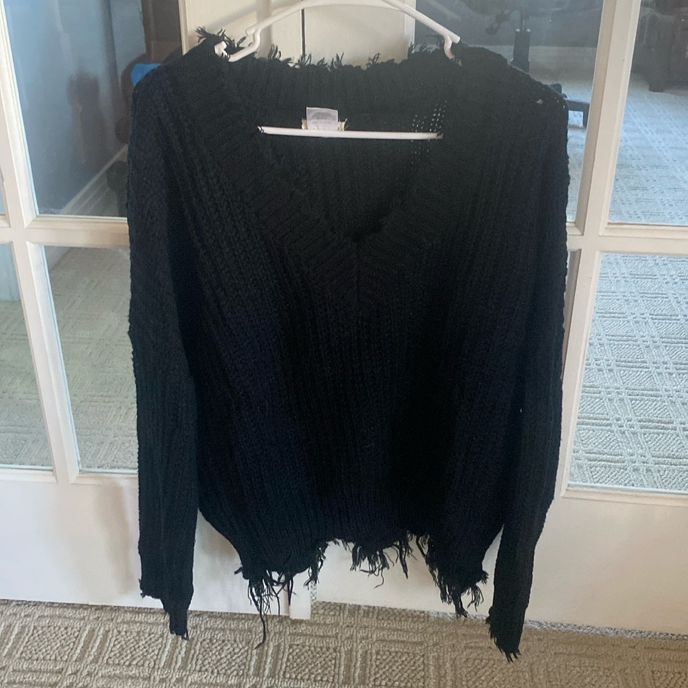 Black vneck sweater with fringe